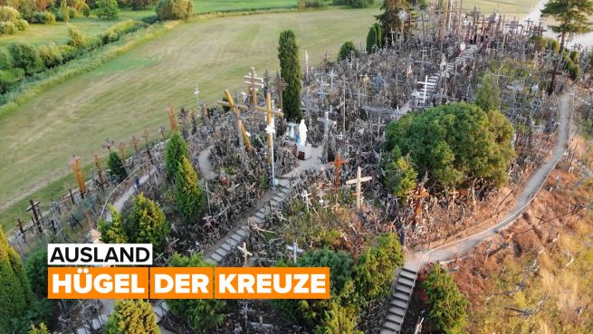 go to Ausland: Hügel der Kreuze